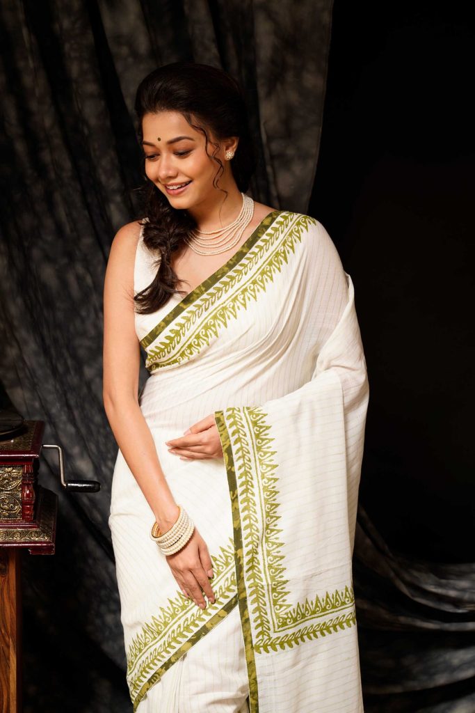 White with olive green striped border cotton saree